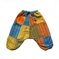 Pantalón tiro bajo para niños, bebes y niñas en patchwork de colores con bolsillo bordado con espiral